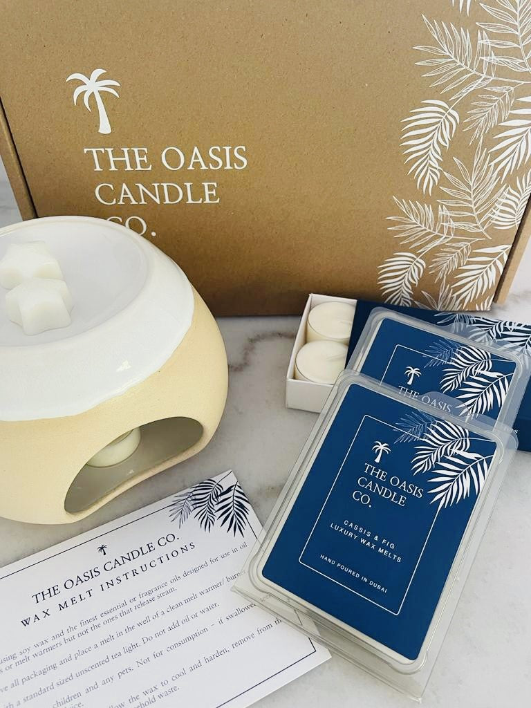 A wax melt burner gift set from The Oasis Candle Co